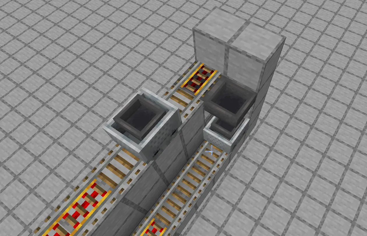 Minecart loader/unloader setup showing a hopper minecart on a powered rail with containers